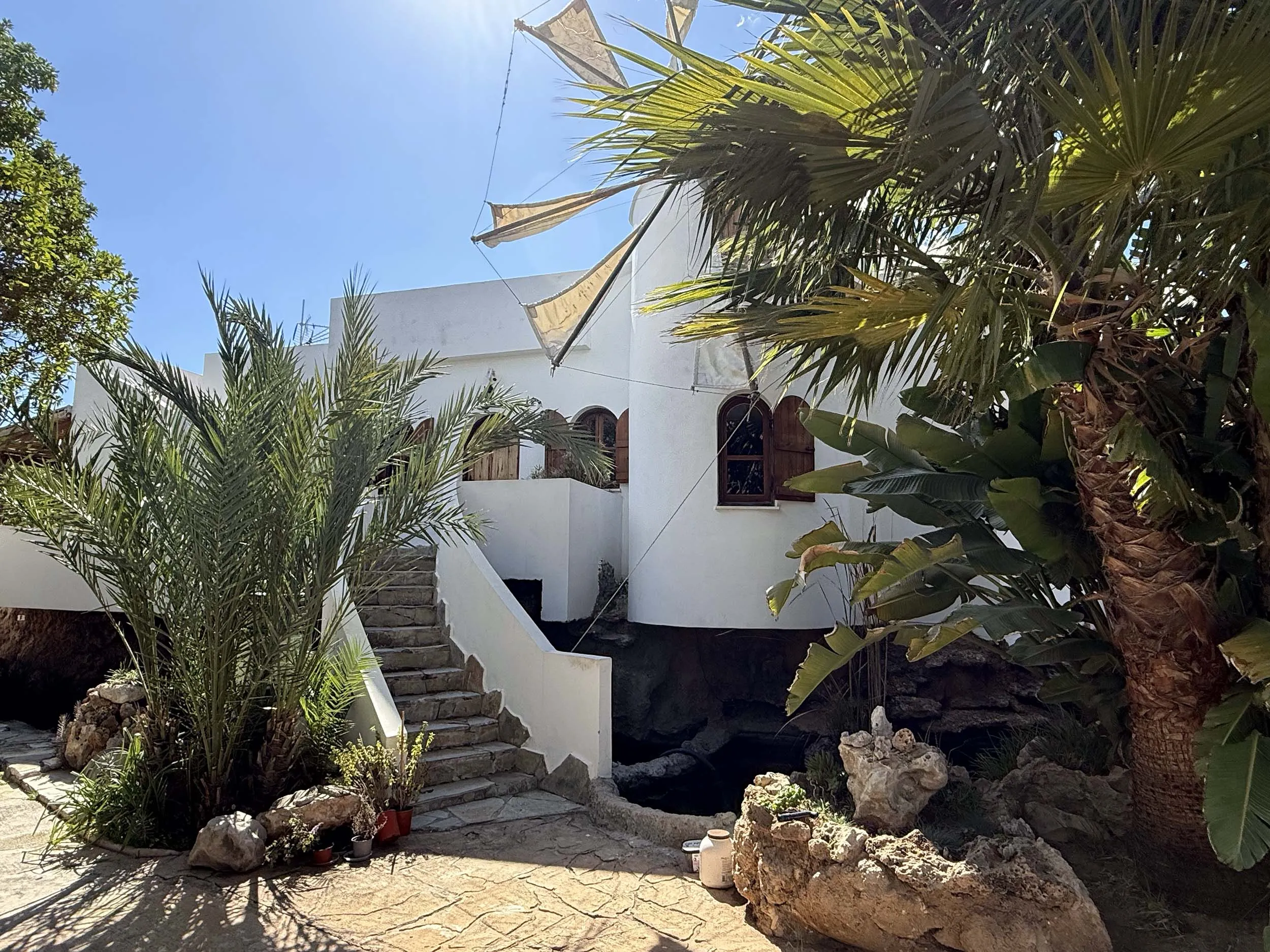 A serene seaside cottage with a sweeping sea view